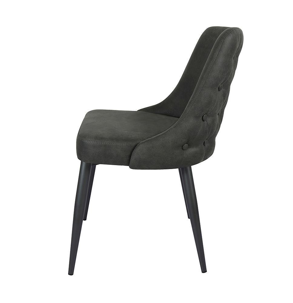 Side view of Cosmo dining chair with sloping arms and tapered legs