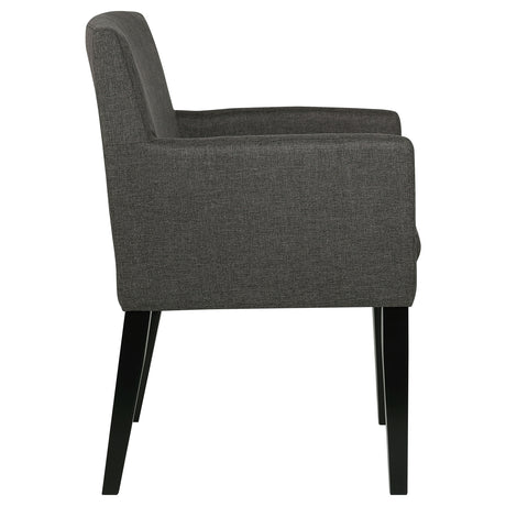 Detail shot of table corner and chair arm on Catherine Dining Set