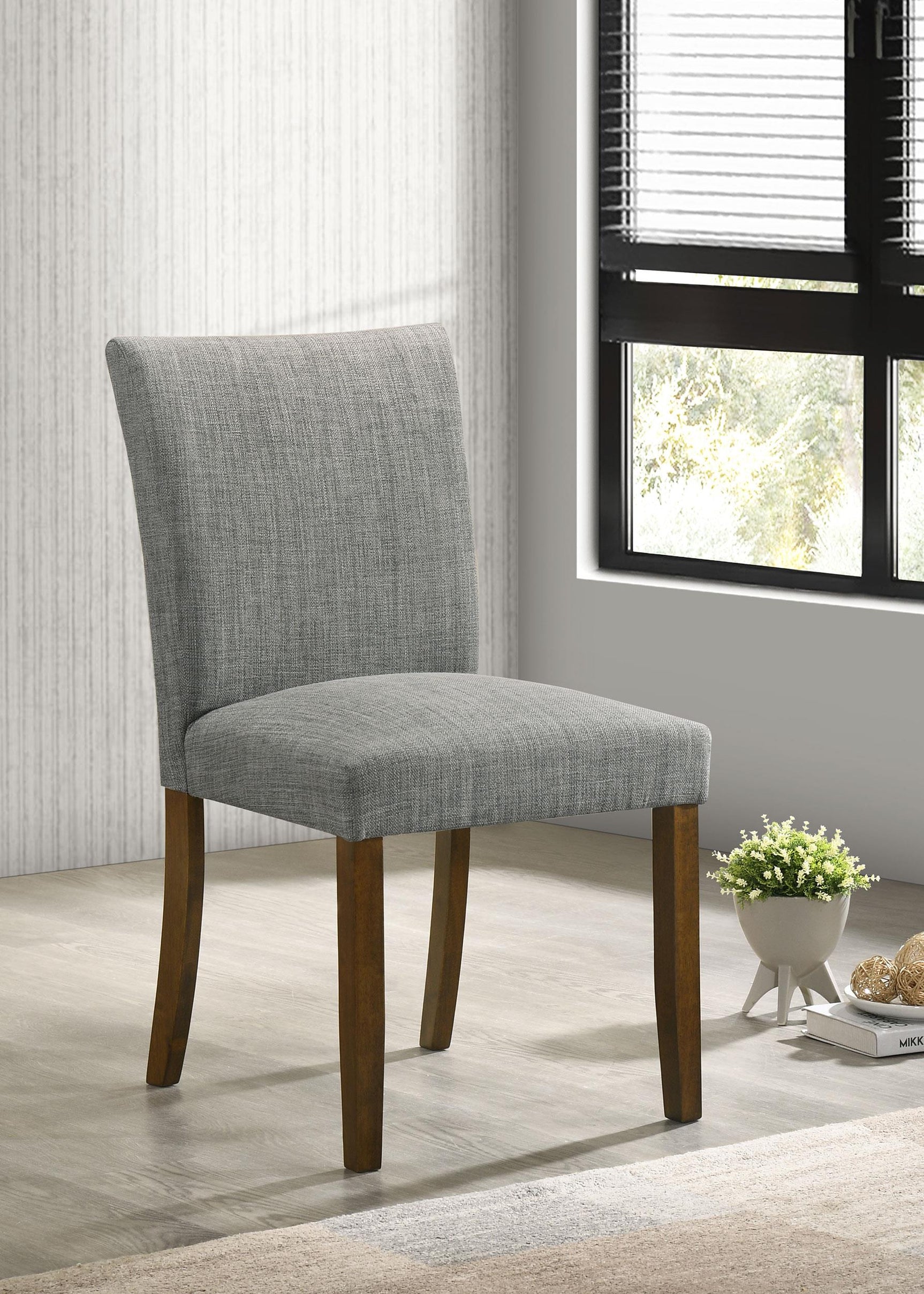 Side view of Cantley upholstered dining side chair in grey fabric