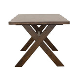 Close-up of Alston dining table X-shaped base in Knotty Nutmeg finish