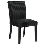 Back view of Dermott black upholstered parson dining chair showing rubberwood legs