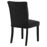 Side profile of Dermott black upholstered dining chair showing seat depth