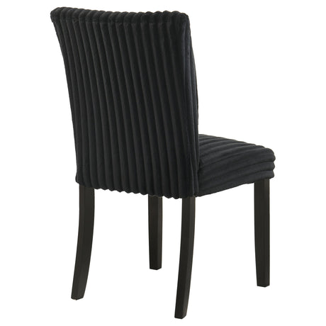 Side profile of Dermott black upholstered dining chair showing seat depth