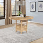 Side view of Lavon oval counter height dining table showing storage