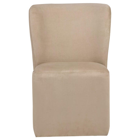 Side view of Jaelynn Parsons dining side chair in tan upholstery