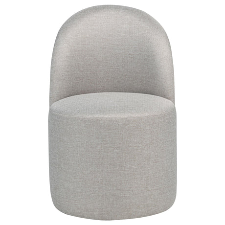 Aubrey Beige Upholstered Barrel Dining Side Chair side angle showing curved back