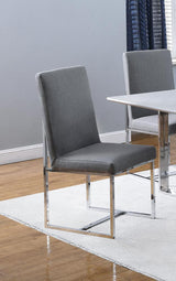 Mackinnon grey upholstered side chair with chrome legs front angle