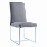 Side view of Mackinnon dining chair with grey fabric and chrome legs