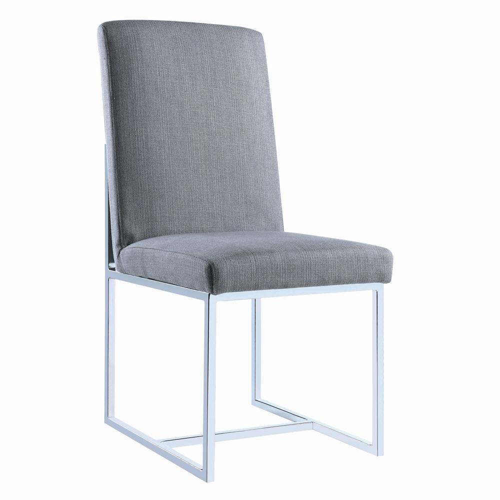 Side view of Mackinnon dining chair with grey fabric and chrome legs