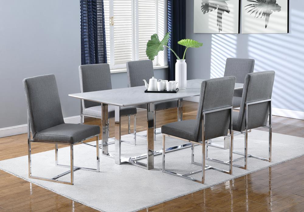 Pair of Mackinnon grey upholstered chairs by dining table