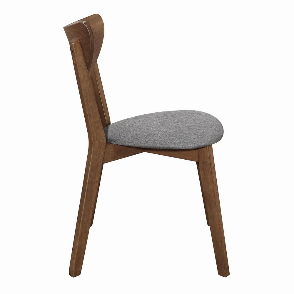 Side angle showing walnut wood frame and upholstery of Alfredo dining chair