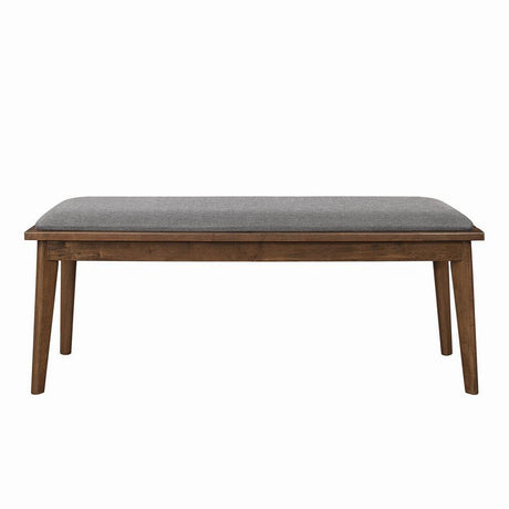 Side angle of Alfredo Upholstered Dining Bench highlighting tapered walnut legs