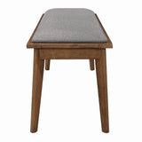 Close-up of grey upholstered seat on Alfredo Dining Bench