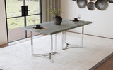 Polished chrome steel base of Sterling dining table detailed view