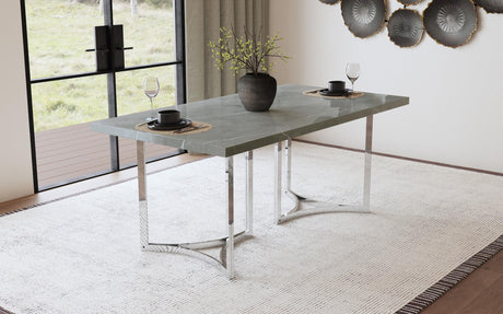Polished chrome steel base of Sterling dining table detailed view