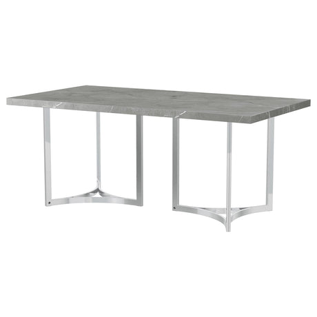 Dining table setup with plates and chairs around Sterling 72-inch table