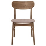 Front view of walnut oval dining table and chairs