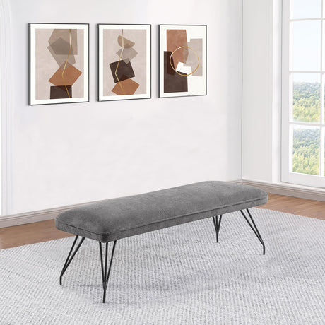 Dodson bench side view highlighting piped trim on grey upholstery
