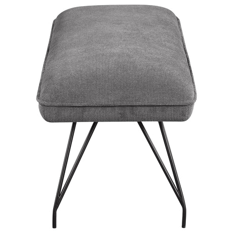 Bench seat corner showing fabric and cushion layers