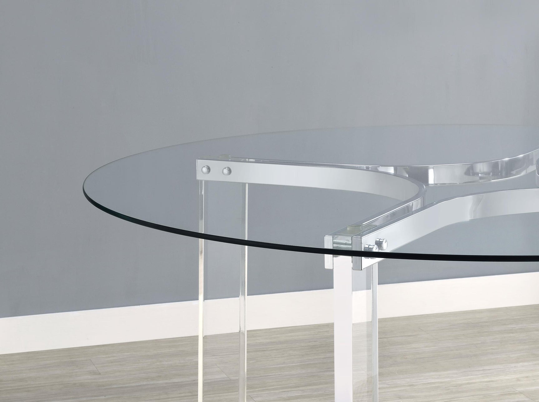 Modern round dining table setting with two chairs