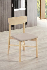 Side angle of Parkridge white washed dining chair showcasing "X" base