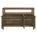 Close-up of metal knob hardware on walnut sideboard