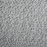 Table surface detail with dark gray finish