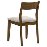Almonte dining chair in dark brown fabric upholstery, side angle