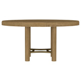 Arini dining table base and aged brass stretcher detail
