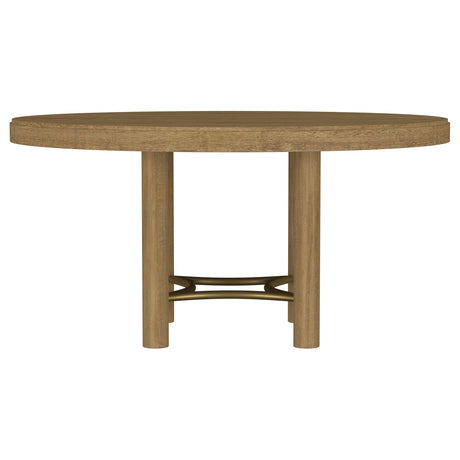 Arini dining table base and aged brass stretcher detail