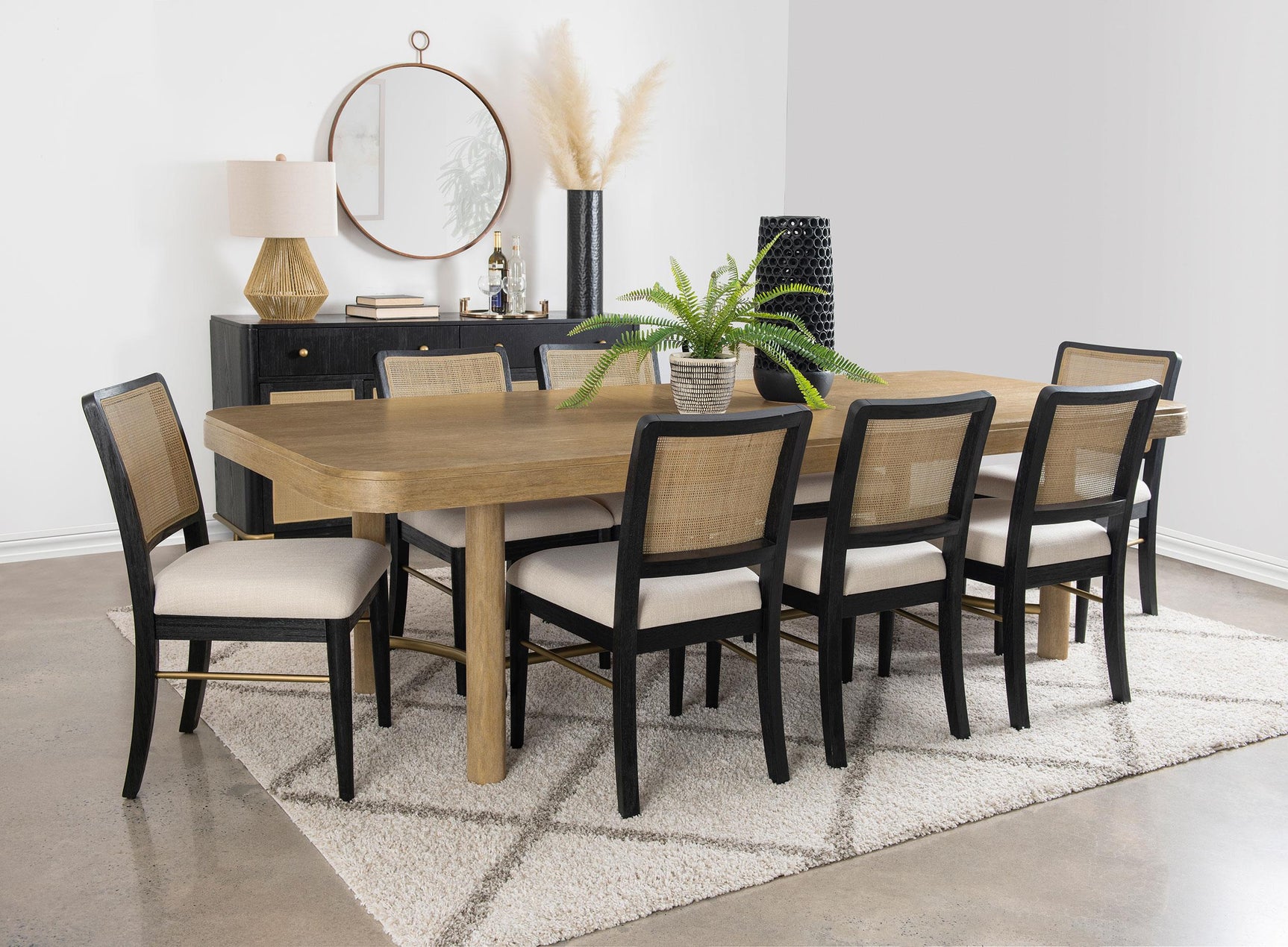 Arini dining table angled view in showroom