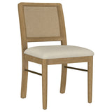 Side angle of Arini dining side chair showing woven cane backrest