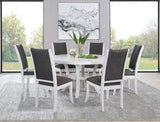 Judd round pearl white dining table with chairs in showroom setting