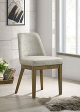 Castlewood dining chair side angle showing upholstery