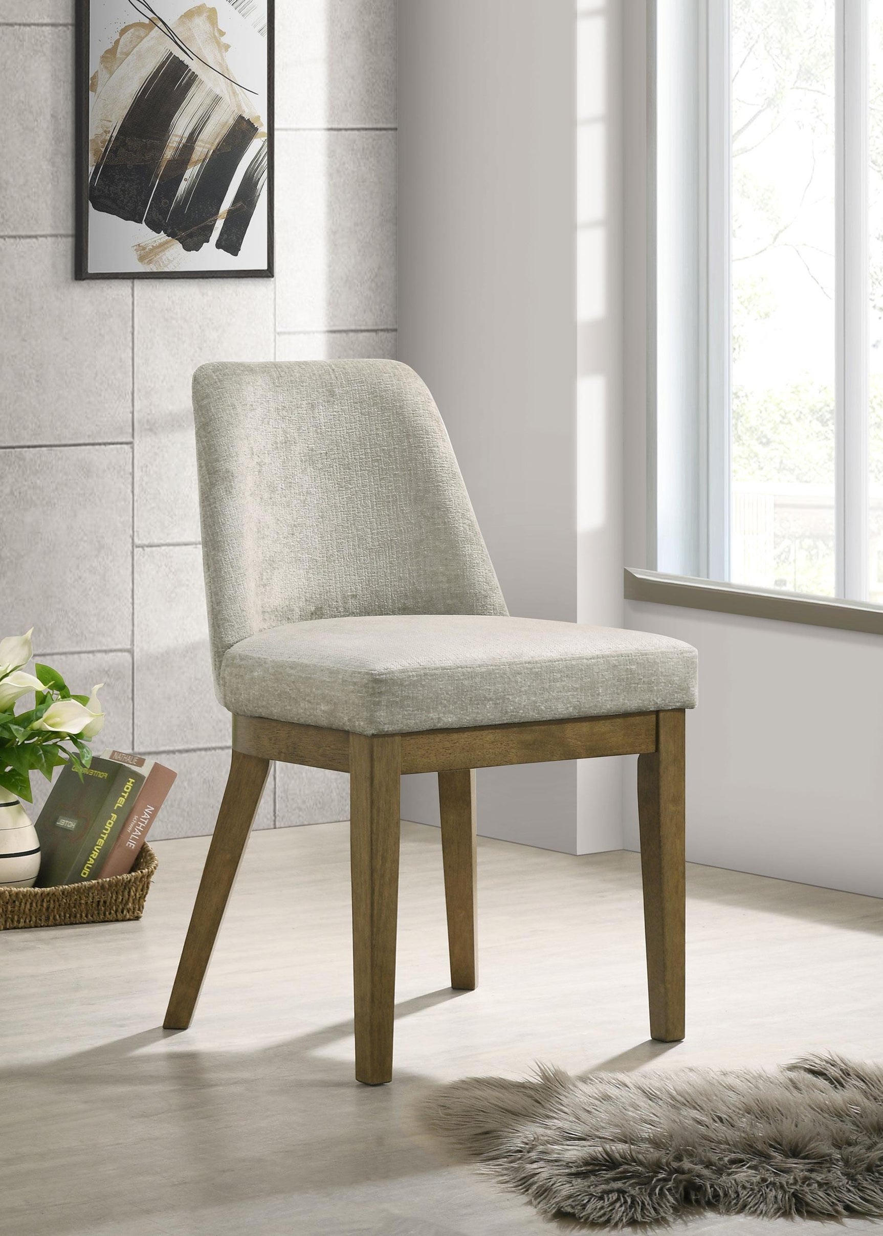 Castlewood dining chair side angle showing upholstery