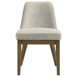 Chair angled to show brown oak legs and frame