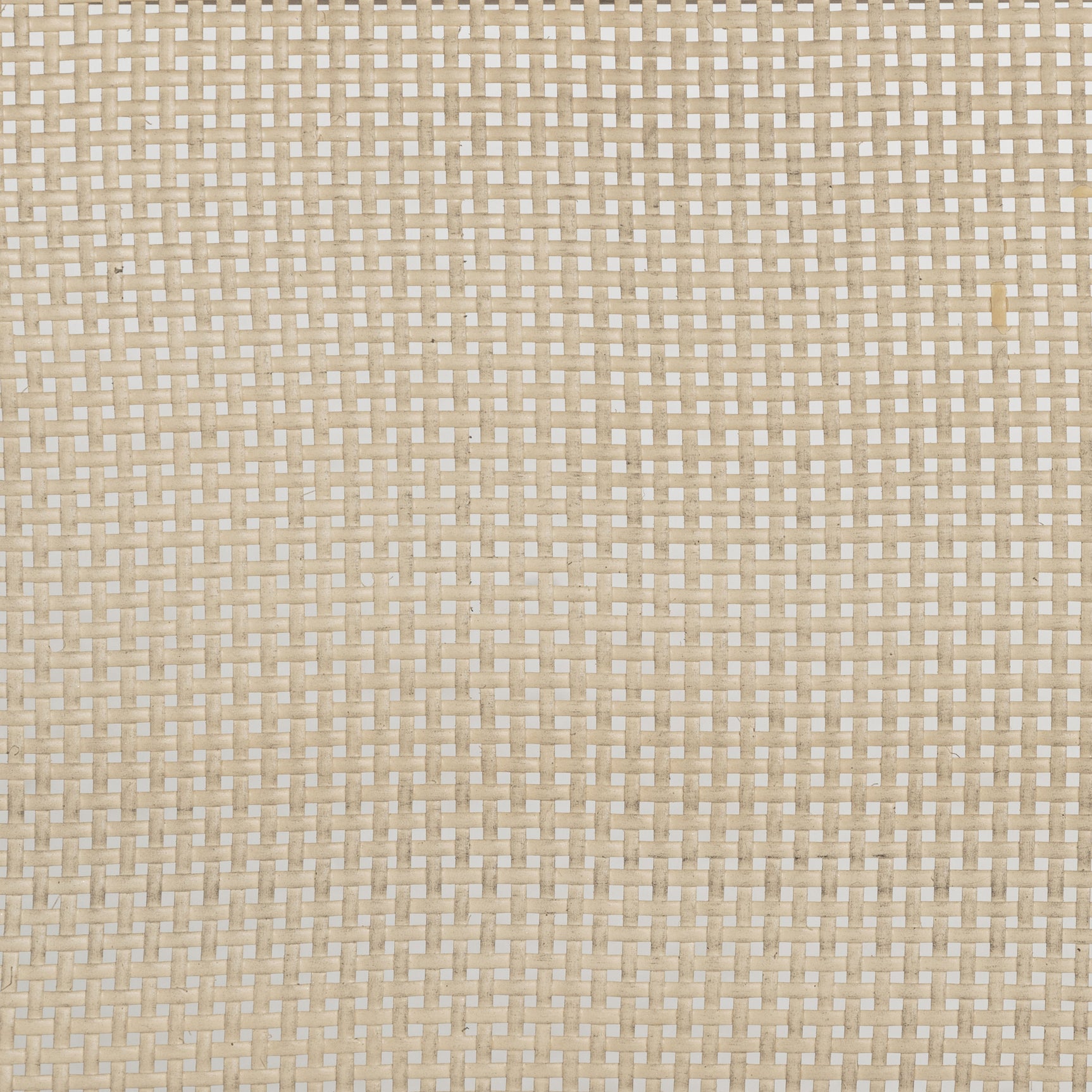 Close-up view of chair cushions and table edges