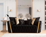Close-up detail of black velvet upholstery and gold accents on Sofia set
