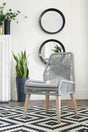 Nakia dining chair grey woven back and seat angled view