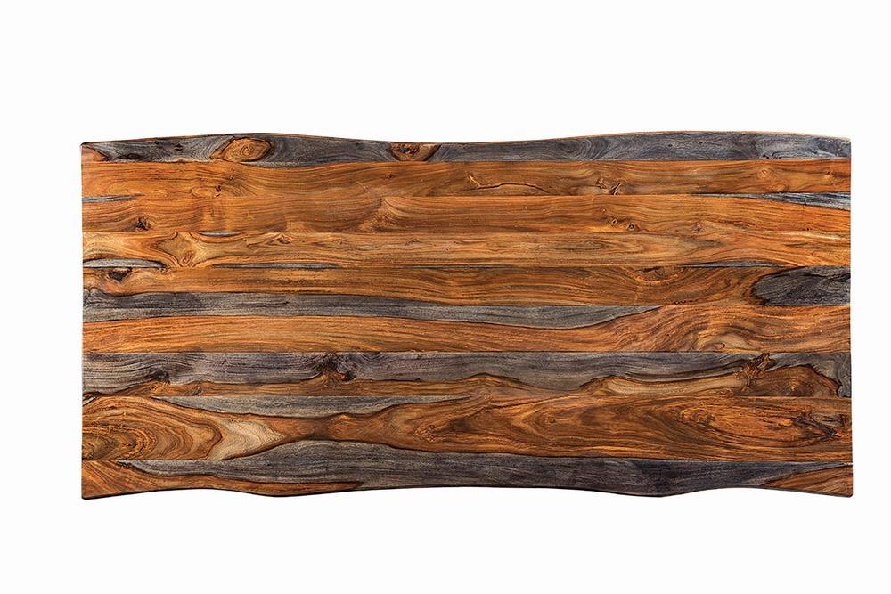 Close-up of live edge detail on grey Sheesham wood dining table top