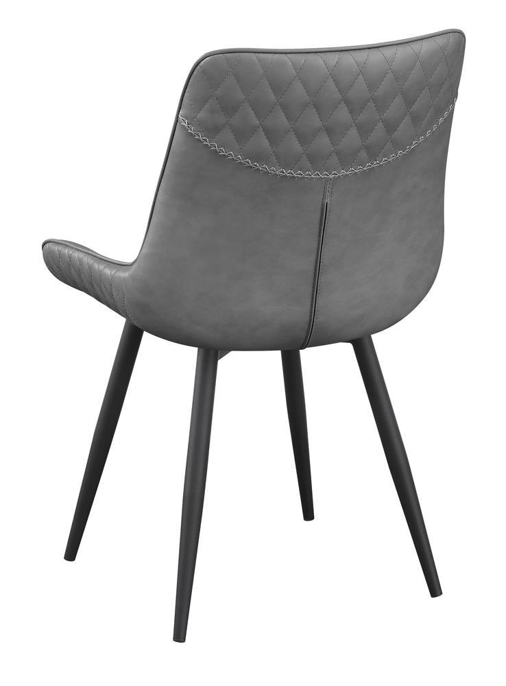 Upholstered seating with plush cushion on Brassie dining chair