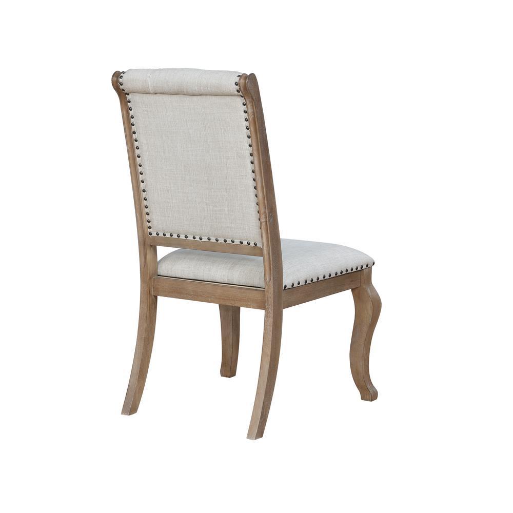 Close-up of diamond tufted backrest with nailhead trim