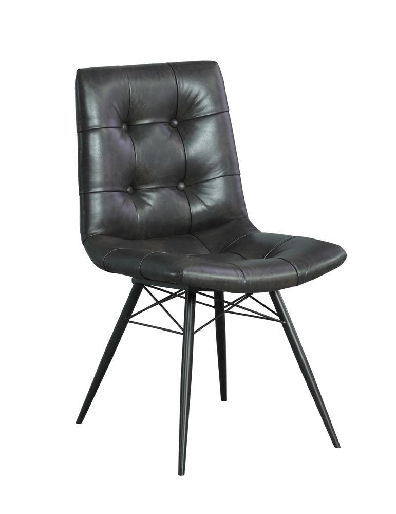 Close-up of charcoal grey button tufted PU leather chair seat