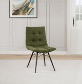 Side angle of Aiken upholstered dining side chair showing curved back and button tufting