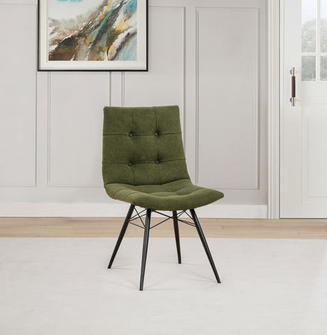 Side angle of Aiken upholstered dining side chair showing curved back and button tufting