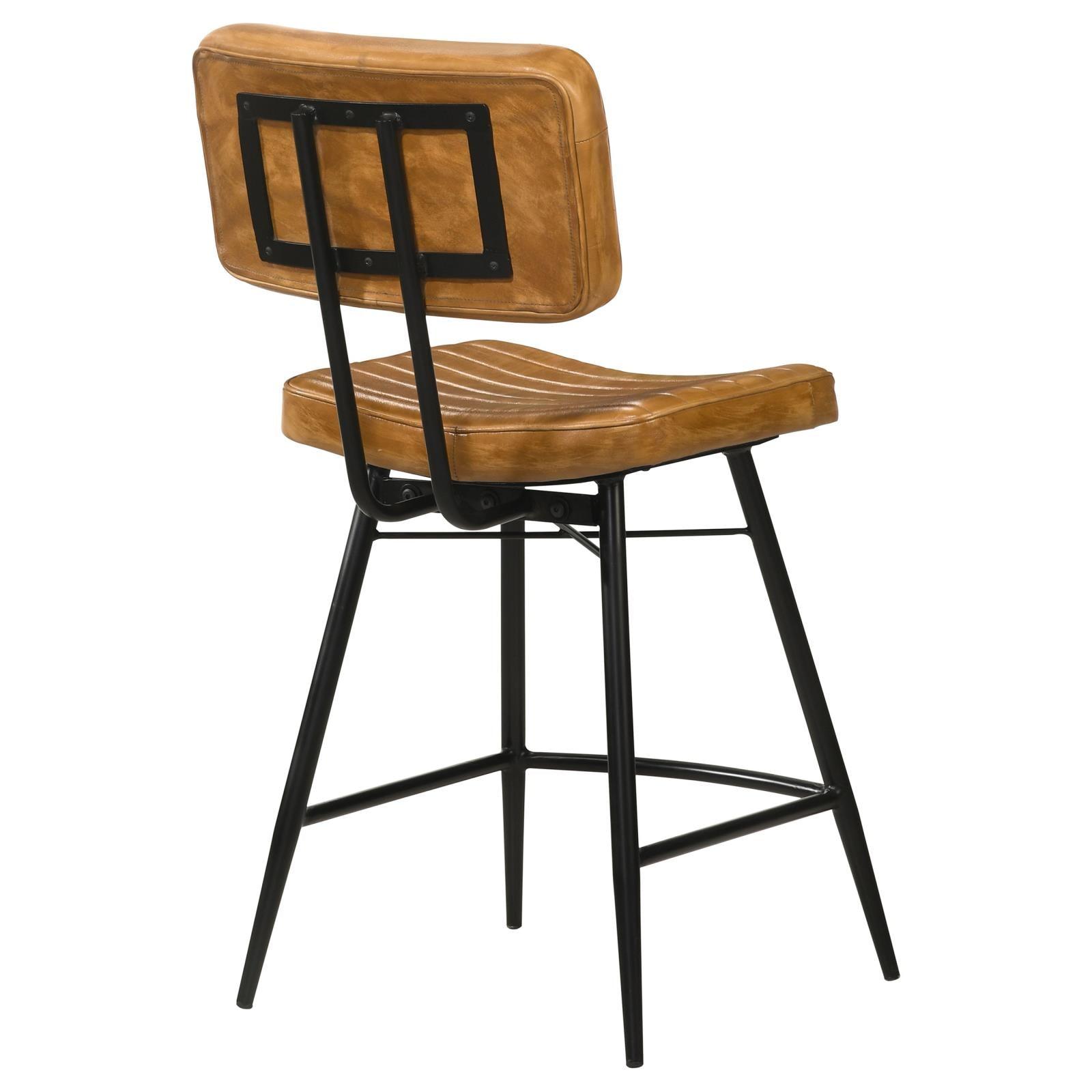 Iron frame and X-shaped backrest detail on Partridge counter height stool