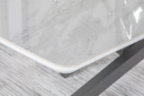 Detail of geometric iron base on dining table