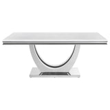Kerwin dining table close-up of faux marble top and beveled edge