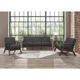 Damala Accent Chair with dark gray upholstery and walnut finish in a room setting