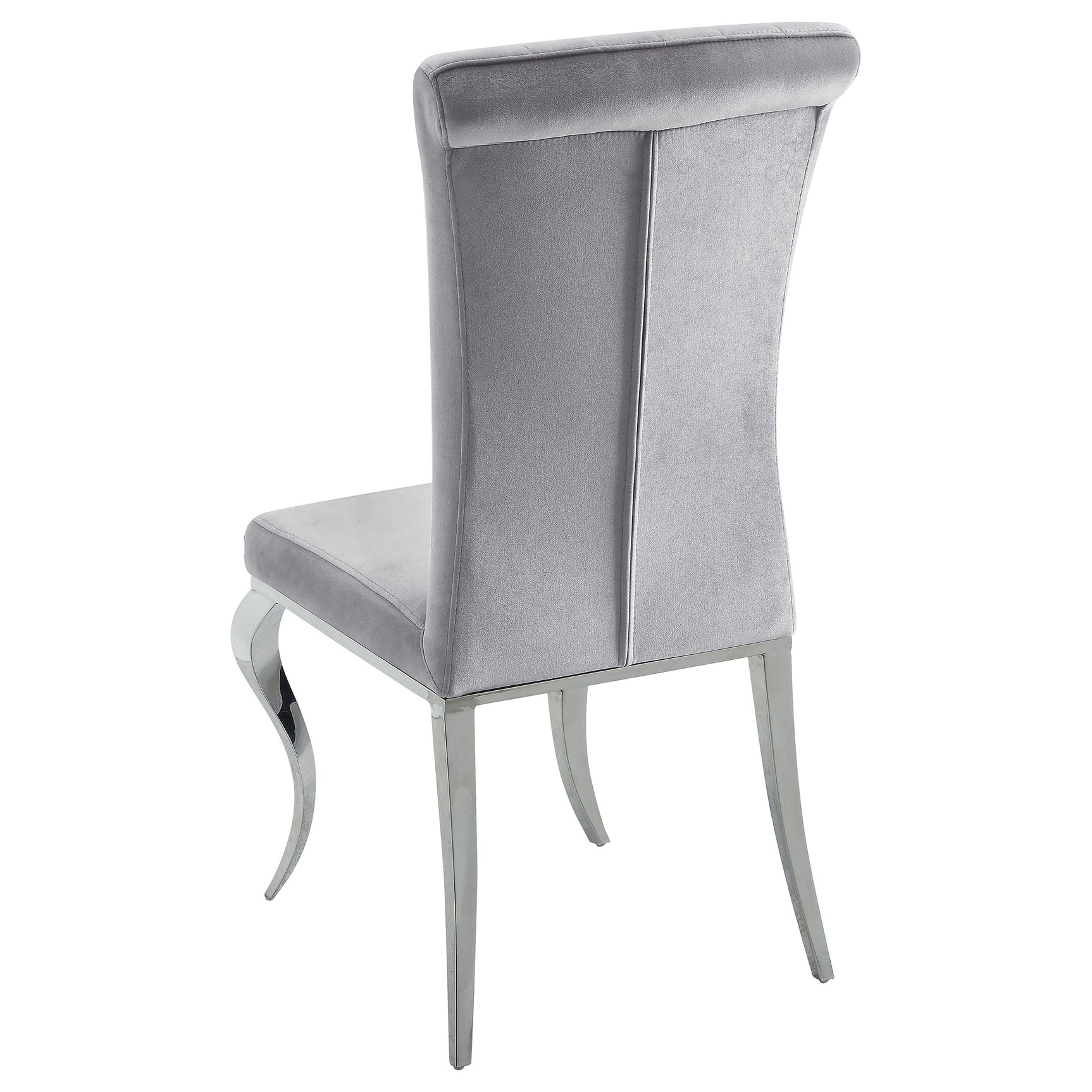 Detailed view of chair upholstery and table finish